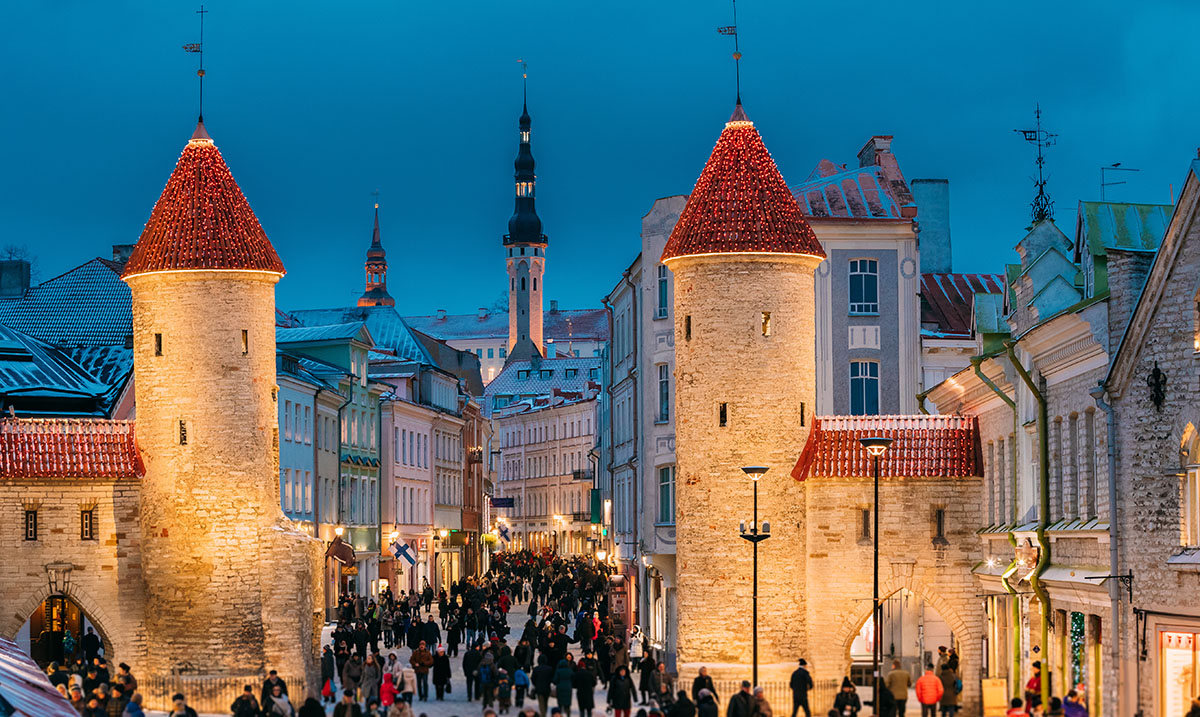 Tallinn, Estonia. People Walking Near Famous Landmark Viru Gate Digital Nomads in Estonia